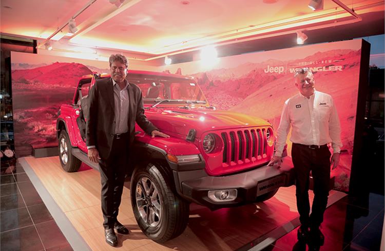 Legendary cricketer Kapil Dev and Kevin Flynn, president and managing director, FCA India, at the launch of the fourth-gen Jeep Wrangler.