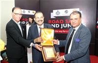 L-R: Rajeev Chaba, president and MD, MG Motor India and P Balendran, executive director, MG Motor India presenting the memento to Jitendra Dhahiya, ADC, Faridabad.