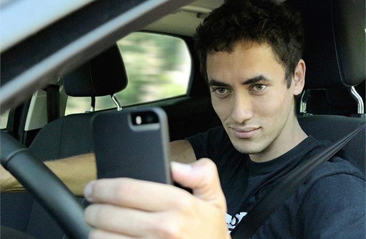 UK motorists urge stiffer penalties for drivers caught using phones behind the wheel