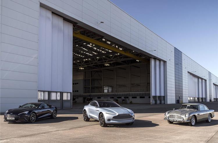 The Aston Martin DBX SUV (centre) will be produced at St Athan from 2019