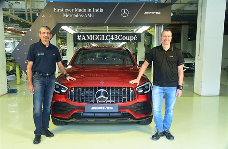 Piyush Arora, Executive Director, Mercedes-Benz India and Martin Schwenk, MD and CEO, Mercedes-Benz India with the made-in-India AMG GLC 43 Coupe.