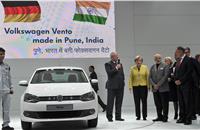 Prof. Dr. Martin Winterkorn, CEO of Volkswagen, with prime minister N Modi and chancellor A Merkel at the VW stand.