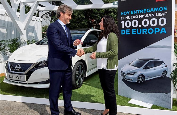 usana de Mena of Madrid is the buyer of the 100,000th Nissan Leaf,
