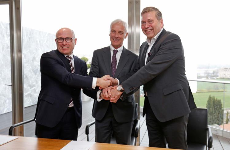 L-R: Bernhard Maier, CEO of Skoda Auto, Matthias Müller, CEO of Volkswagen AG, and Guenter Butschek, CEO and managing director of Tata Motors .