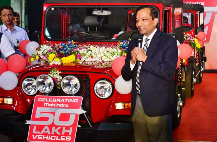 Dr Pawan Goenka with  the landmark vehicle, a 4x4 Thar.