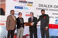 6.	Saharash Damani, CEO, FADA, and Dilip Chenoy, director general, FICCI, present the Employee Engagement Initiatives award to Cargo Motors.