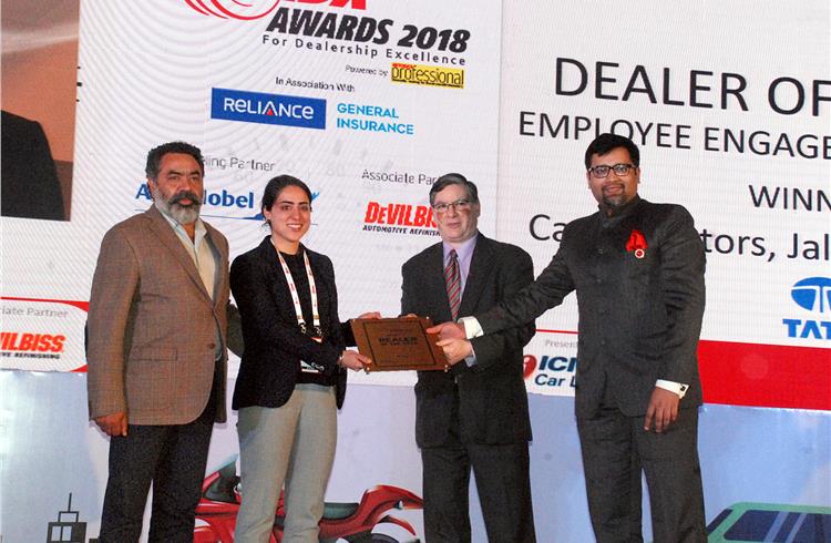 6.	Saharash Damani, CEO, FADA, and Dilip Chenoy, director general, FICCI, present the Employee Engagement Initiatives award to Cargo Motors.