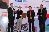 Prakash Rao, Ian Saldhanah and Ravi Narayanan present the award for the Commercial Dealer of the Year to Cargo Motors.