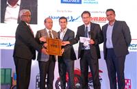 Nikunj Sanghi, Sachin Shilavat and Prasanth Chandrashekharan present the Two-Wheeler Dealer of the Year runner-up award to ESS ELL Motors.
