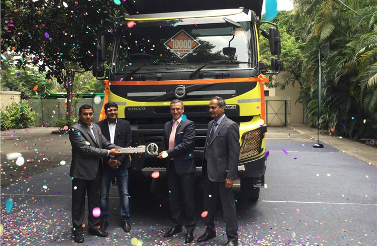 Pierre Jean Verge Salamon, president, Volvo Group Truck Sales in India, hands over the 10,000th truck to Mahalaxmi Infracontract.