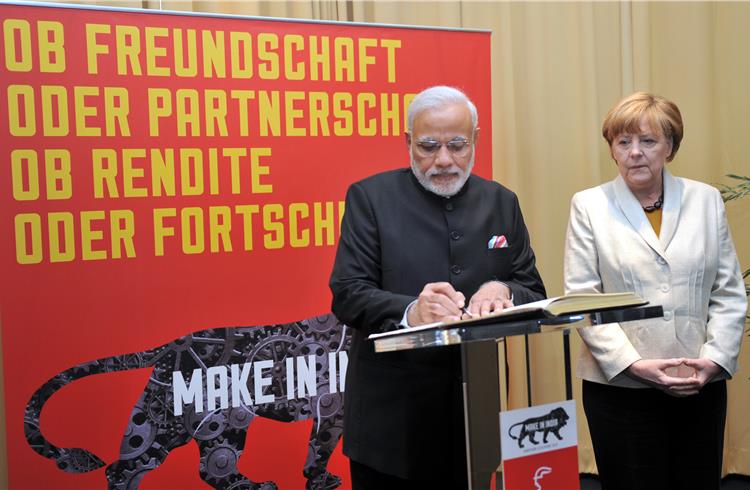 File photo of Prime Minister Narendra Modi and Chancellor Angela Merkel at the opening ceremony of the Hannover Messe in Germany on April 12, 2015. Image Courtesy: PIB