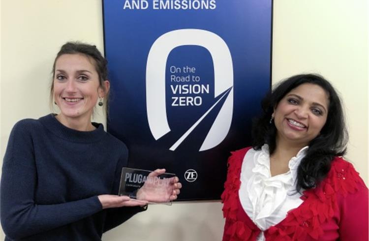 Chief Digital Officer Mamatha Chamarthi (right) and Malgorzata Wiklinska, Head of Digital Ecosystem and Global Innovation Hubs (left), with the Plug and Play Corporate Innovation Award.
