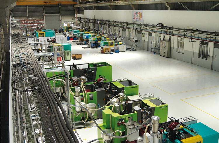 The Chakan plant has 13 injection moulding machines. The company sells around 1,000 different parts to OEMs every month.