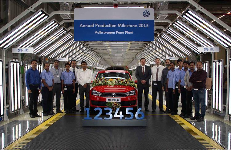 VW India management along with staffers celebrate the rollout of the 123,456th car, a VW Vento at the Chakan plant.