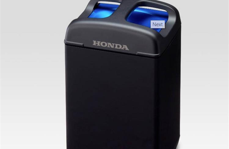 Honda Mobile Power Pack, a swappable mobile battery that can be used to power small electric vehicles.