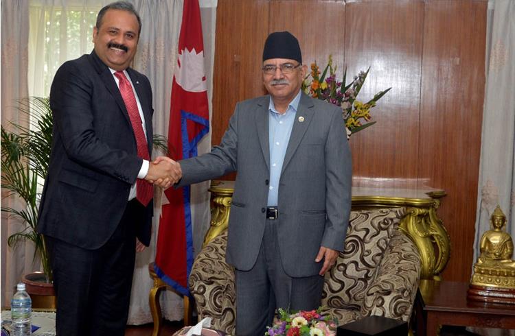 Prime minister of Nepal, Pushpa Kamal Dahal (right) with Sumit Sawhney, country CEO and MD, Renault India Operations.