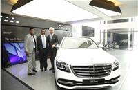 (L-R) Krishnakumar, executive director, Rajasree Motors; S Sivakumar - MD, Rajasree Motors and Roland Folger, MD and CEO Mercedes-Benz  with the new S-Class at the newly opened Mercedes-Benz showroom in Thiruvananthapuram.