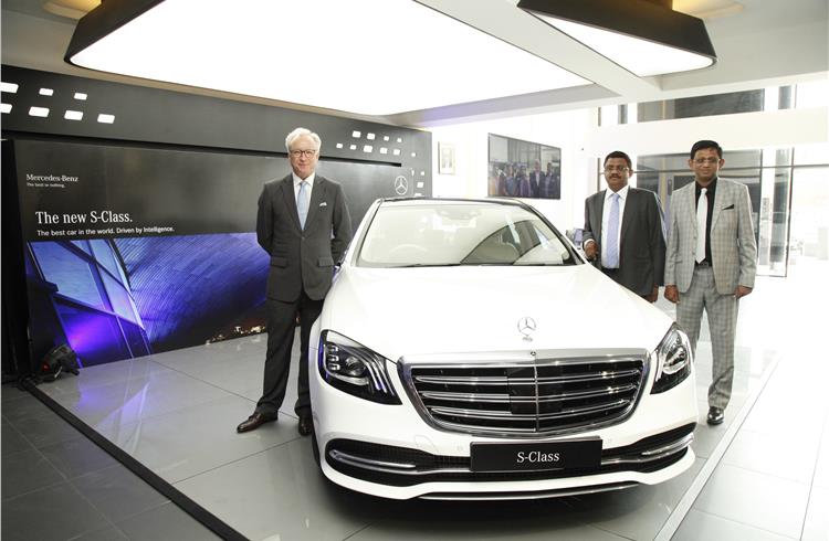 (L-R) Roland Folger - MD and CEO, Mercedes-Benz India; S Sivakumar, MD, Rajasree Motors and Krishnakumar, executive director, Rajasree Motors with the new Mercedes-Benz S-Class.