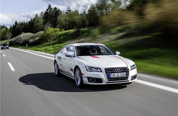 Audi piloted driving research car displays social manners