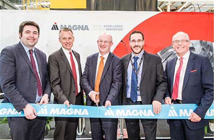 Magna officials were joined by Ian Harnett from Jaguar Land Rover (centre) and members of local government to celebrate the opening of Magna’s new aluminum casting facility in Telford, England.
