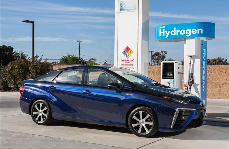 A Toyota fuel cell vehicle gets tanked up on hydrogen.