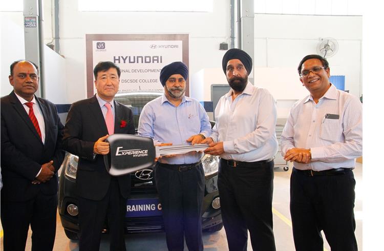 L-R: S Punnaivunam, YK Koo, MD & CEO, Hyundai Motor India, and Taranjit Singh, MD, JIS Group, at the inauguration ceremony