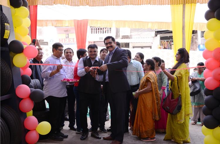 Sanjay Mathur(R), general manager for Pirelli tyres in India inaugurating Pirelli Tyre Centre in Vadodara