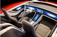 The car's dashboard and central console have been transformed into an electronic display