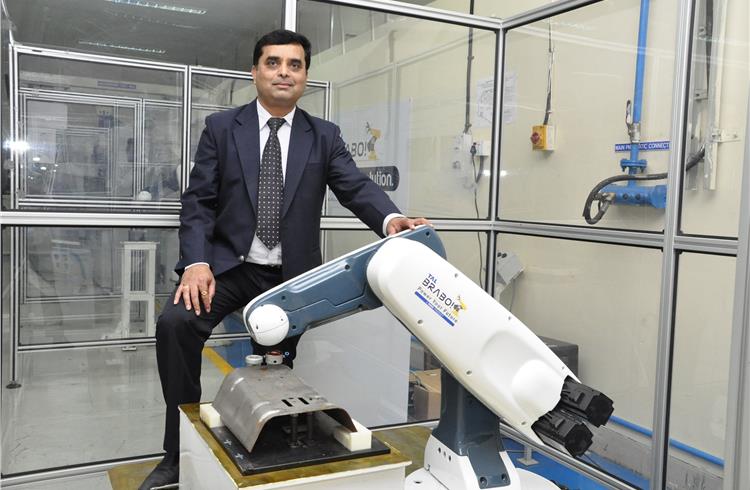 Amit Bhingurde, chief operations officer, TAL Manufacturing & Solutions, with the Brabo 2kg industrial articulated robot.