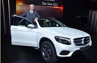 Roland Folger, MD and CEO, Mercedes-Benz India with the GLC at the Auto Expo.