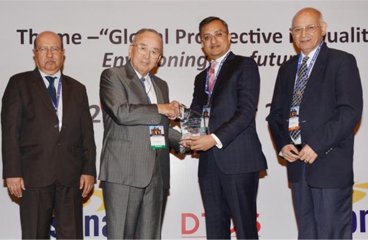 Rohit Saboo, president and CEO of National Engineering Industries (second from right), receives the Ashoka Award.