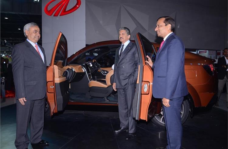 L-R: Pravin Shah, Anand Mahindra and Dr Pawan Goenka with the new coupe crossover XUV Aero.