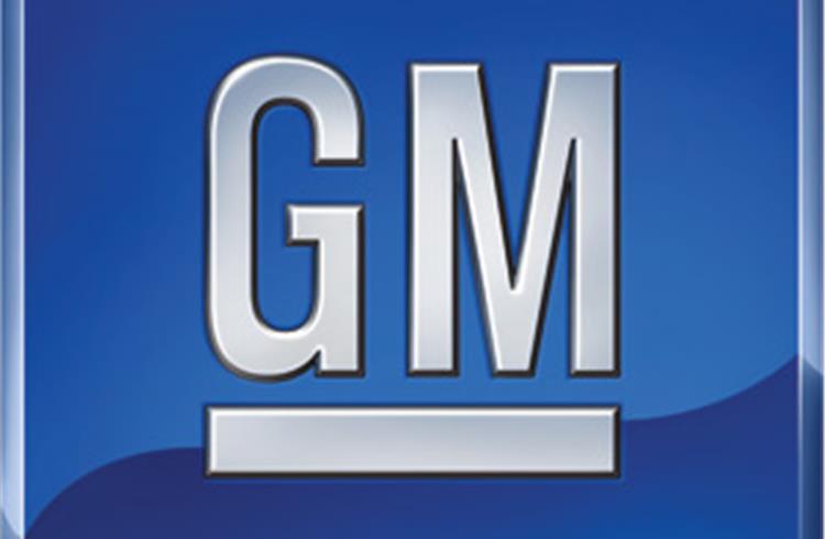 GM reports record losses