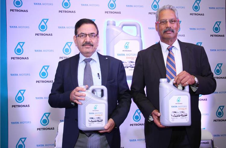 L-R: Dinesh Bhasin, Head, Customer Support, PVBU, Tata Motors, and M P Singh, CEO, Petronas Lubricants (India), launch the Tata Motors Genuine Oil range in Mumbai.