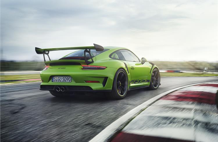 New 911 GT3 RS 520 hp from a four-litre engine, accelerates from 0 to 100kph in 3.2sec and has a top speed of 312kph.