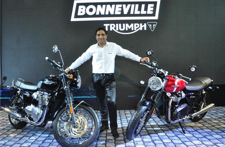 Vimal Sumbly, managing director, Triumph Motorcycles India, with the new Bonneville T120 and the Street Twin.