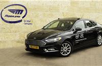 The first of the Intel-Mobileye 100 car fleet hits the road in Jerusalem in May 2018. (Credit: Intel Corporation)
