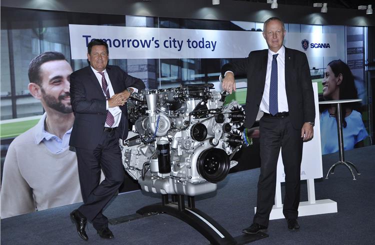 Anders Grundströmer, managing director, Scania India (left) with the ethanol engine.