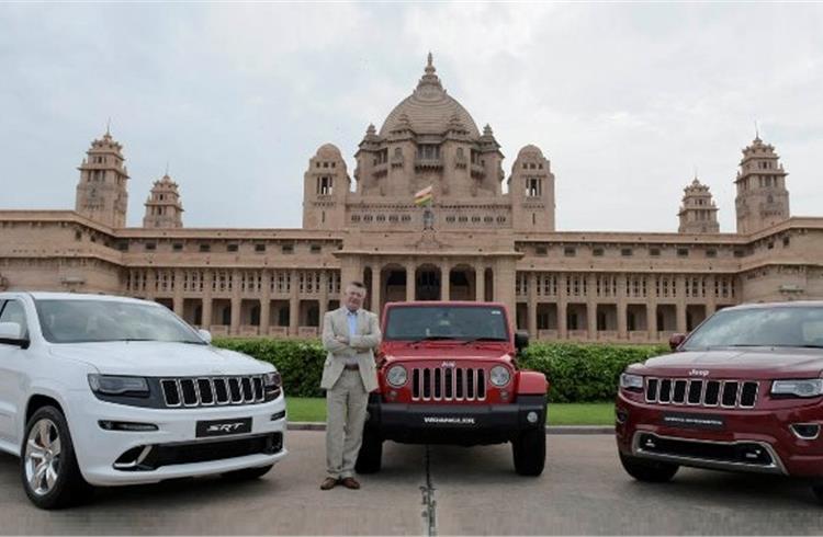 Kevin Flynn, President and MD, FCA India, with the Grand Cherokee SRT, Wrangler Unlimited and Grand Cherokee.Summit.