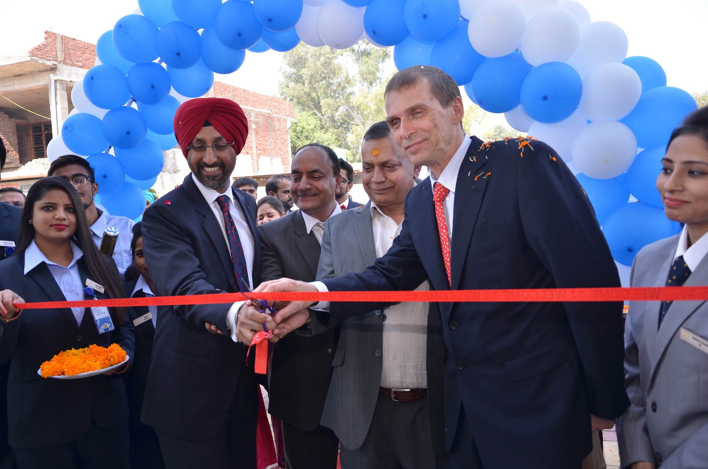 hardeep-brar-vice-president-of-sales-at-gm-india-and-markus-sternberg-vice-president-of-aftersales-and-customer-experience-gm-india-at-the-innauguration-of-ambala-automobiles-1