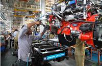 Engine along with transmission transferred to the conveyor for mounting on the chassis. Ashok Leyland the sole OEM to make engine and transmission in-house.