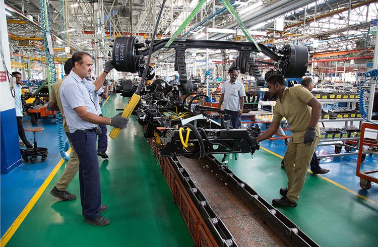 Front axle with suspension getting ready to be mounted on a vehicle. Ashok Leyland produces front axles in-house with its own technology and processes.