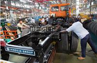 Tyres being mounted. There are three modules of conveyor belts such as indexing, continuous and bench design for the products and processes.