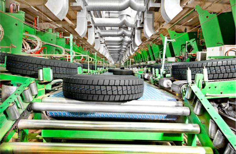 Apollo Tyres reports Rs 166 crore profit in Q1 2013-14