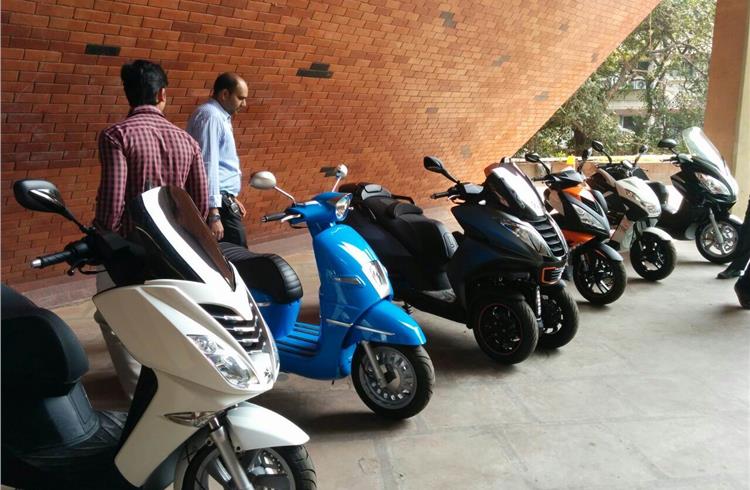 A row of Peugeot scooters at Mahindra Towers, at Worli in Mumbai