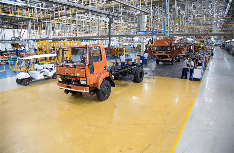 Trucks moving out of the assembly conveyor en route to be tested on a roller test bench. Once certified OK, they will make their way into the real world.