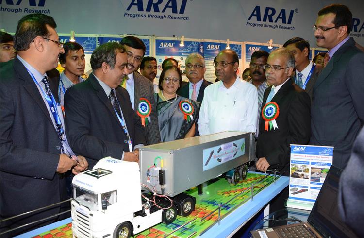 Anant Geete, Union minister for Heavy Industries, seen here with Rashmi Urdhwareshe, director, ARAI, gets informed about a road geometry studies project undertaken by ARAI.
