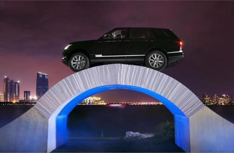 Range Rover luxury SUV completed world's first drive across one-off paper bridge.