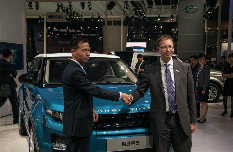 JLR's joint venture boss Chris Bryant (right) unveiled the Chinese Evoque.