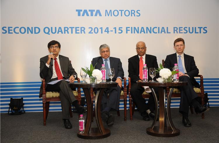 L-R: Tata Motors' Mayank Pareek, Ravi Pisharody, C Ramakrishnan and JLR's CFO Kenneth Gregor.